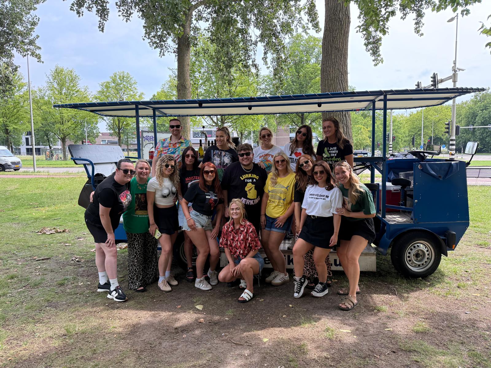 Mixed group enjoying summer beer bike ride